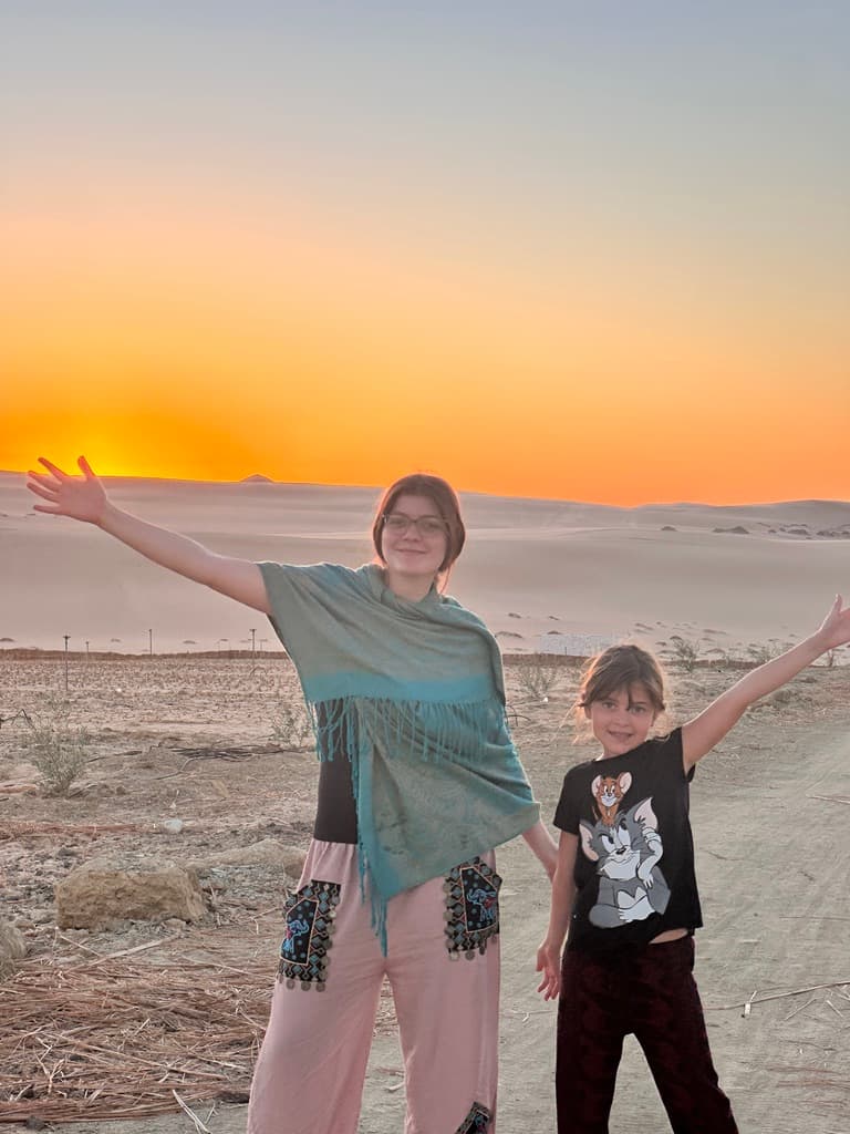 A family moment at sunset on the land