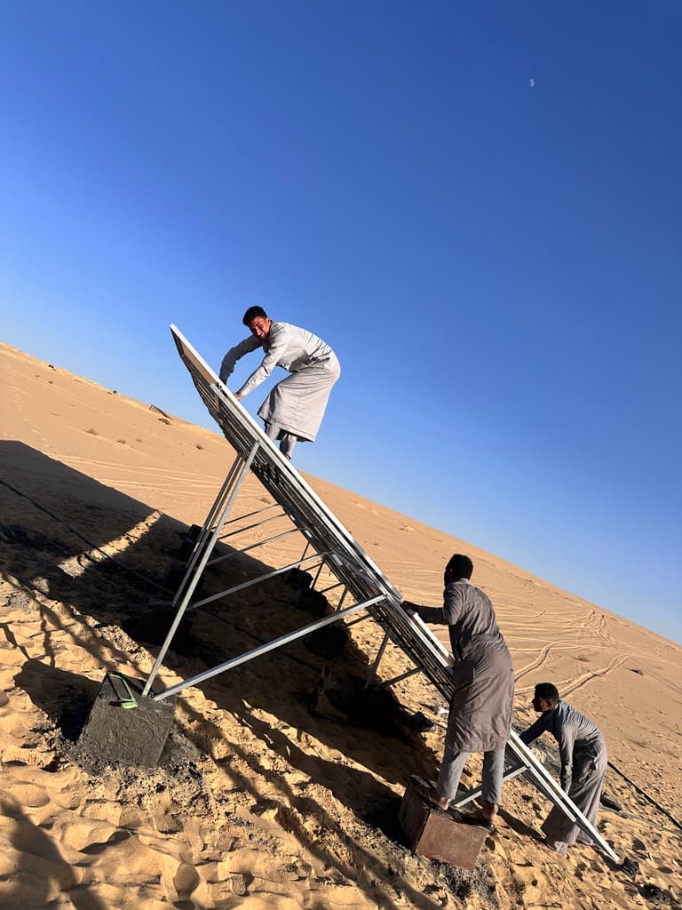 Workers installing the LK Dunes solar energy system
